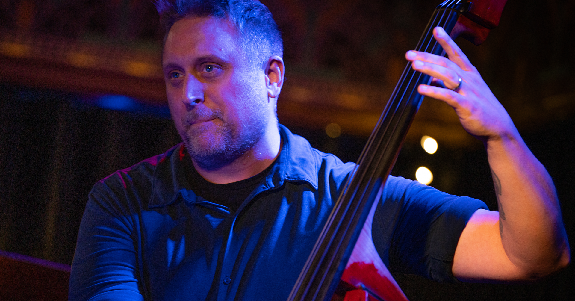 A photo of Jeff Weiss playing double bass.