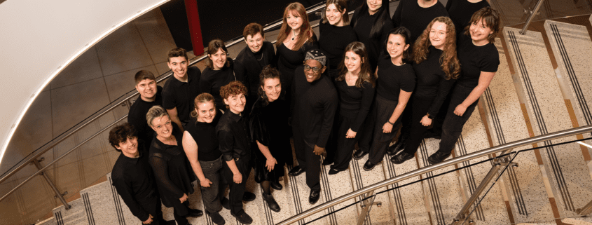 A photo of the C8dence vocal ensemble.