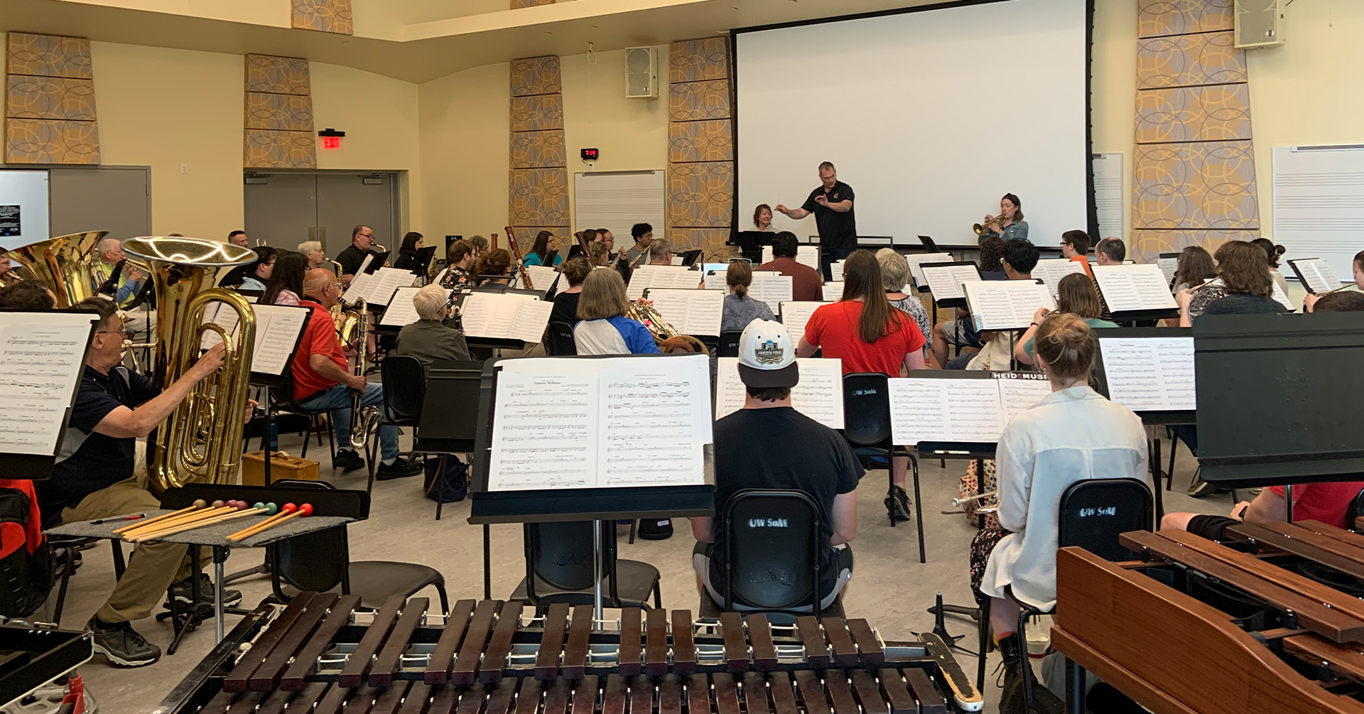 A photo of Summer Band at UW–Madison with Scott Teeple conducting.