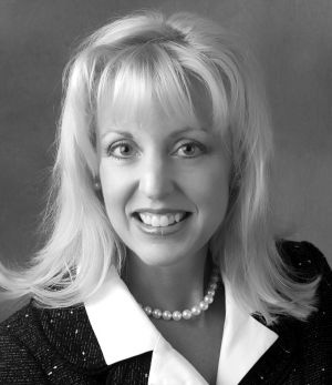A black and white headshot of Karen Krieger Bishop