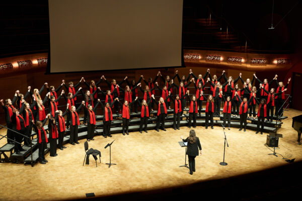 An image of Treble Choir performing on stage at the Hamel Music Center.
