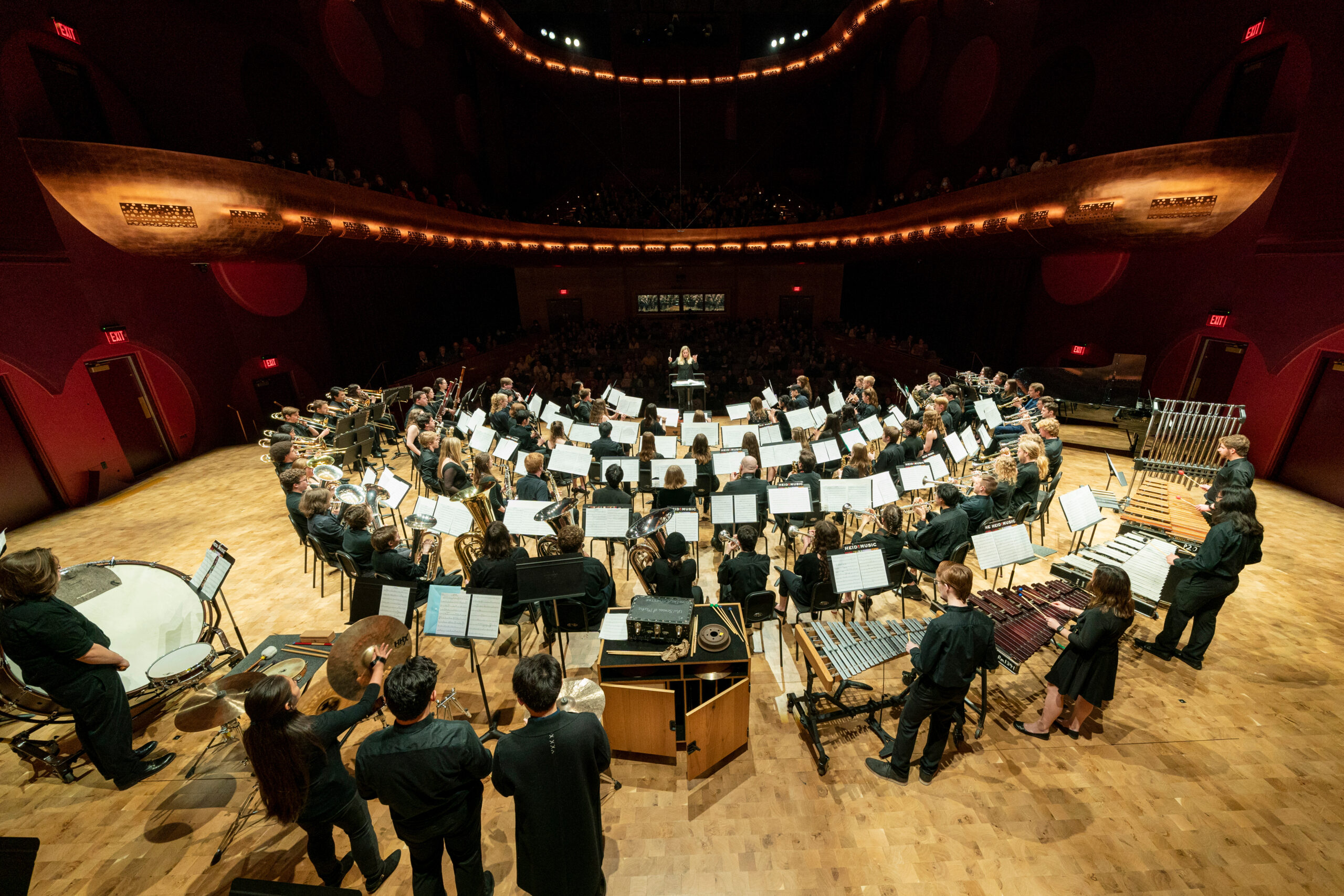 An image of University Bands performing on stage at the Hamel Music Center.