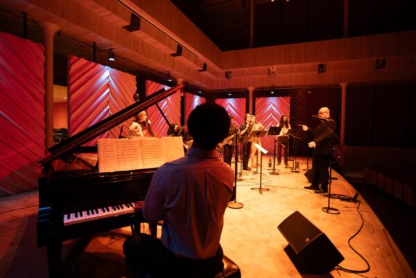 A photo of Afro-Cuban Jazz Ensemble on stage in Collins Recital Hall at the Hamel Music Center.