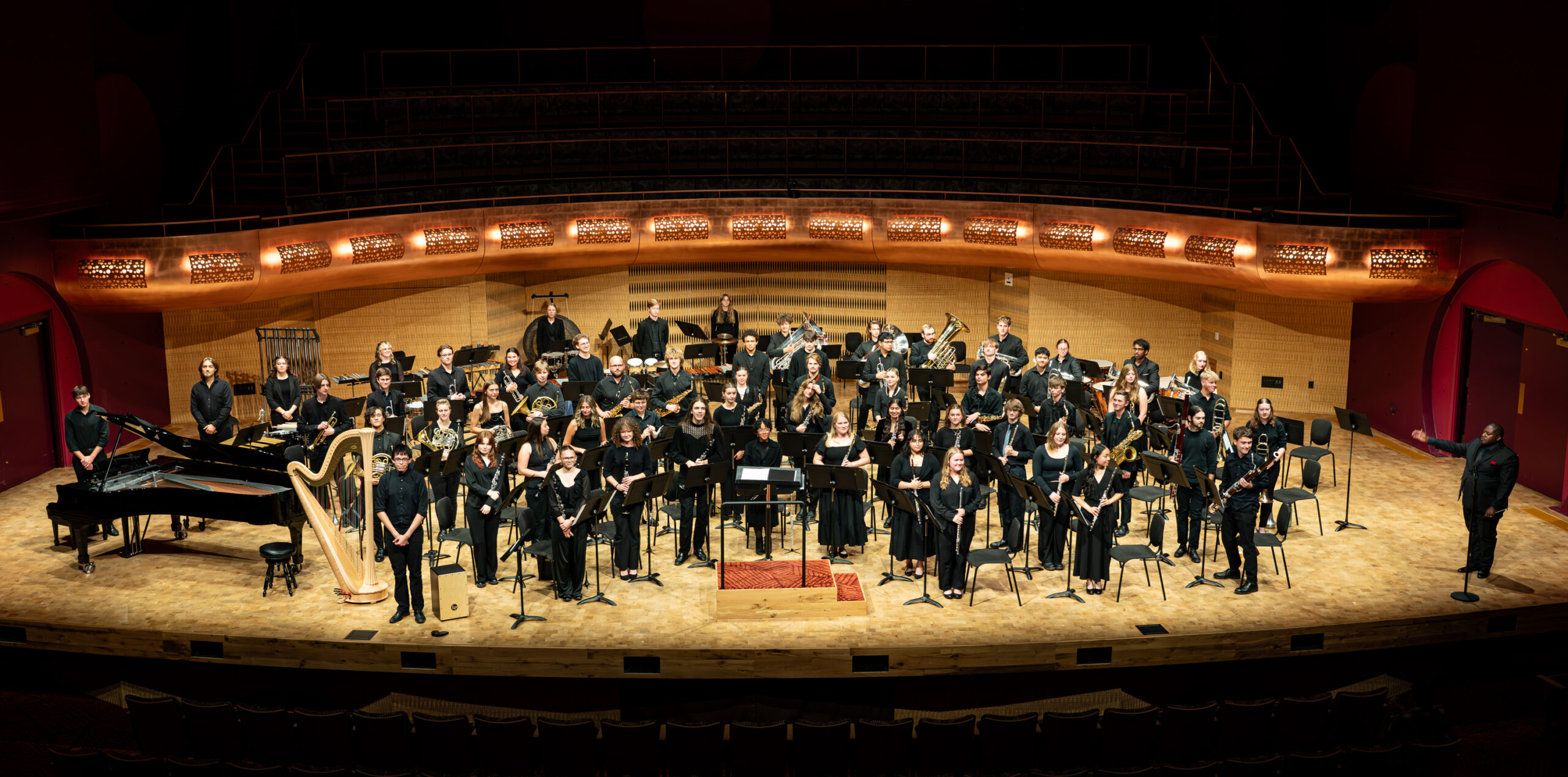 A photo of Concert Band on stage at the Hamel Music Center.