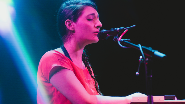 A photo of Lea Bertucci performing.