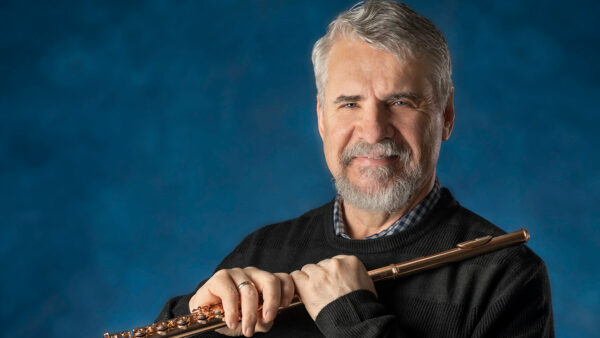 A photo of Ransom Wilson holding a flute.