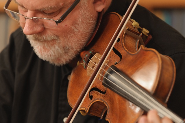 A photo of Eugene Purdue playing violin.